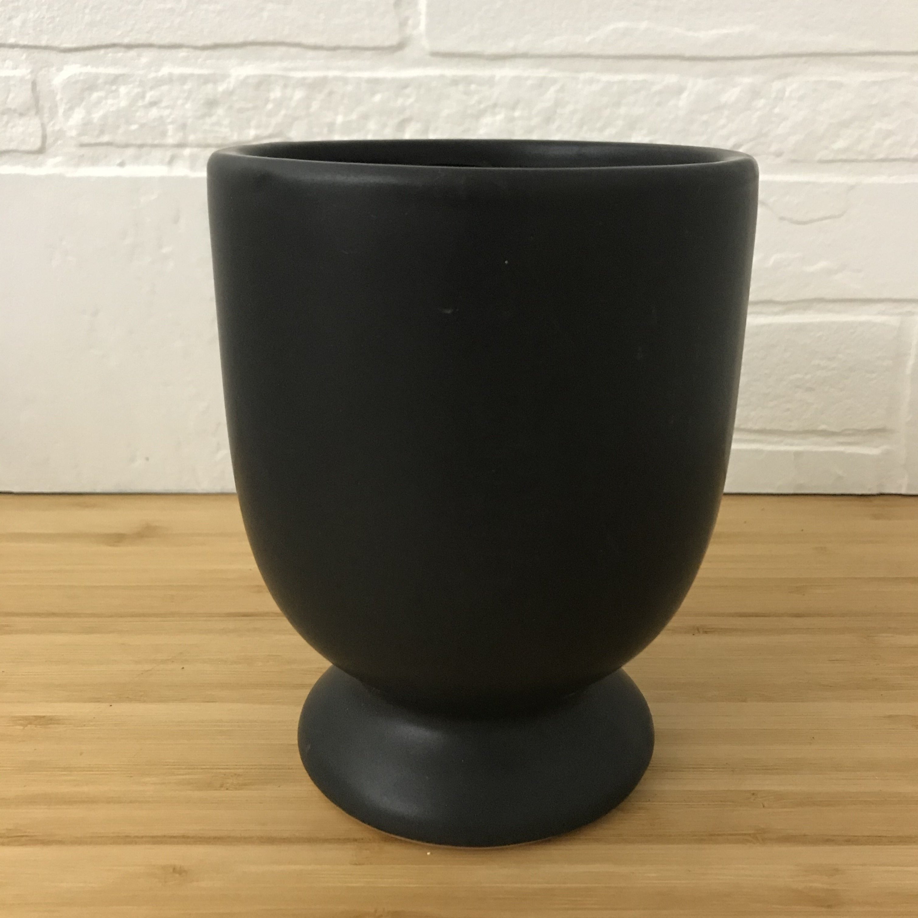 4" black footed plant pot